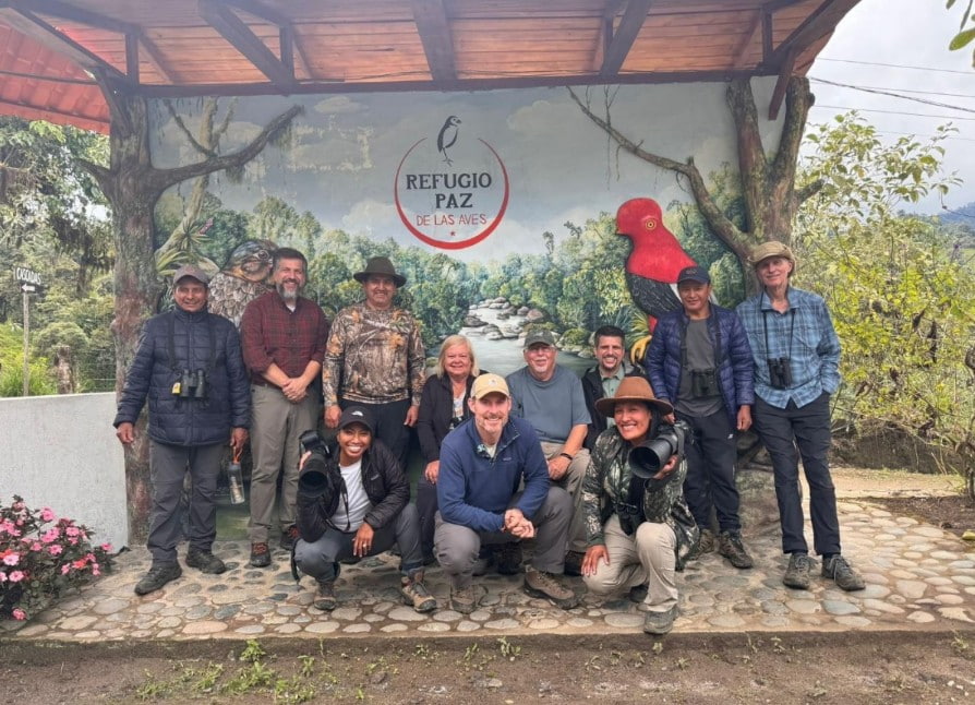 Birding tour group with local guides exploring Ecuador