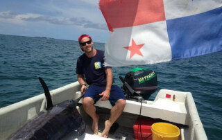 Panama flag waving while on the boat with our black marlin catch while fishing Tuna Coast