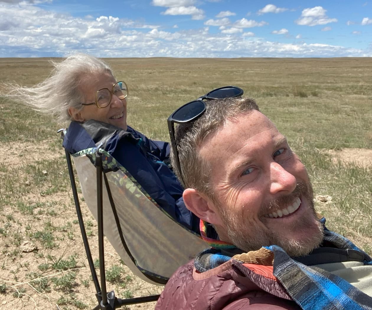 A woman with her tour guide on an accessible birdwatching tour near Denver, Colorado