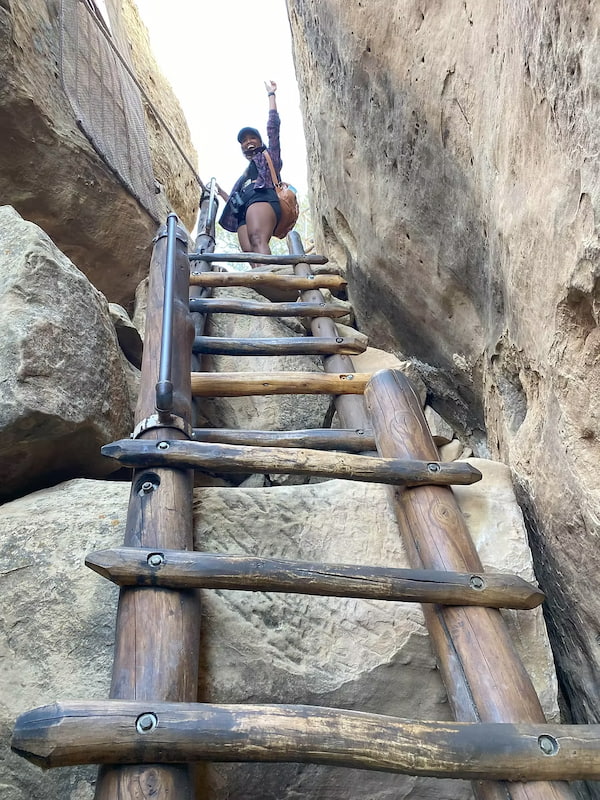 Climbing ladders through the cliff dwellings of Mesa Verde National Park