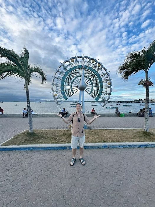 Peacock statue on boardwalk in Puerto Princesa