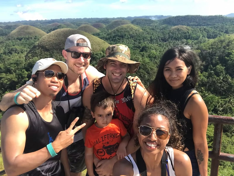 Group photo in front of the Chocolate Hills of Bohol Island