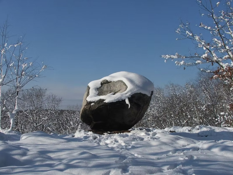Wolf Rock in the snowy woods of Connecticut
