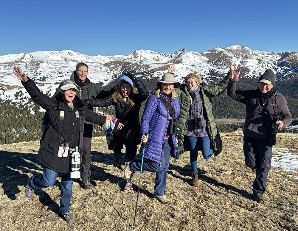 Mountain Chicken Chase group celebrating a ptarmigan sighting at Loveland Pass